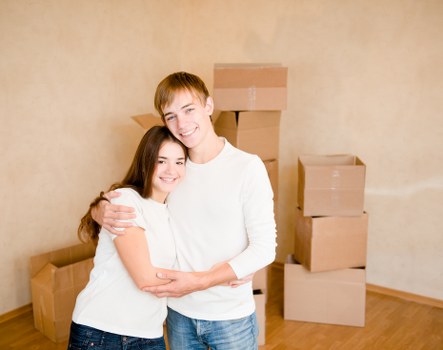 Family packing belongings for mobile self storage in Chadwellheath