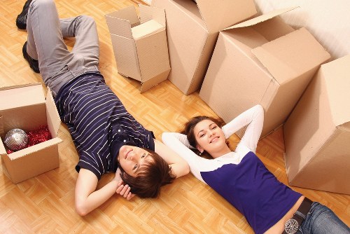 Packed office boxes and furniture prepared for relocation