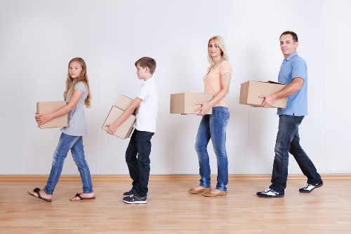 Careful handling of sofas and tables for local storage